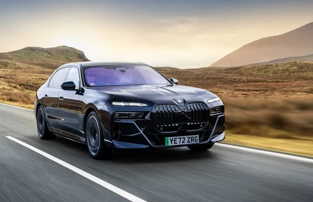 Black BMW on highway ,about